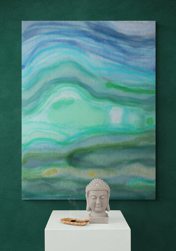Tranquil blue and green abstract canvas art over a plinth with a Buddha bust, creating a serene decor atmosphere