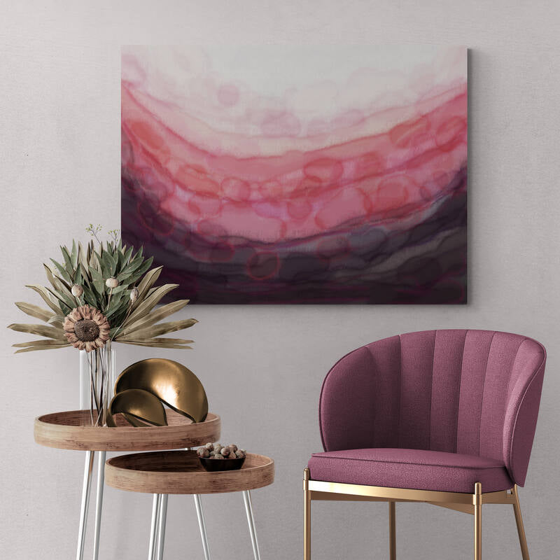 Modern interior with dusky pink calming abstract canvas art for wall by Louise Mead, stylish pink chair, and wooden side tables.